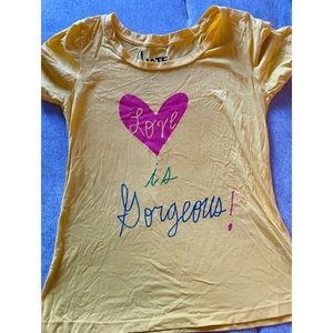 Vibrant cute yellow t-shirt “LOVE IS GORGEOUS” Size M. Urban Outfitters